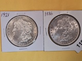 Two About Uncirculated plus Morgan Silver Dollars