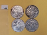 Four mixed American Silver Eagles