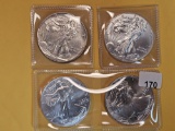 Four mixed American Silver Eagles