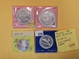 Four mixed Silver World Coins