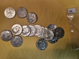 Sixteen mixed silver Kennedy Half Dollars