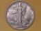 Semi-Key 1919-D Walking Liberty Half Dollar in About Uncirculated 55