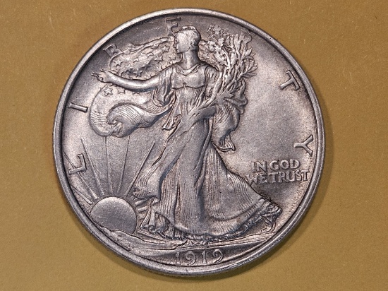 Semi-Key 1919-D Walking Liberty Half Dollar in About Uncirculated 55