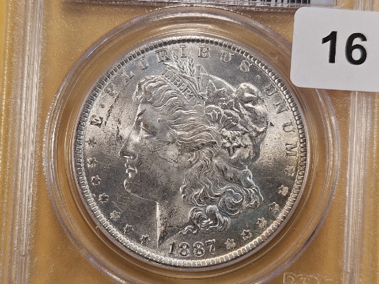PCGS 1887 Morgan Silver Dollar in Mint State 64
