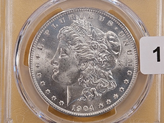 PCGS 1904-O Morgan Silver Dollar in Mint State 64