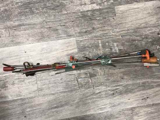 LOT OF LARGE CLEANING RODS