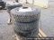 4 - 295/75r22. 5 rear drive tires, 10 hole hub pilot rims on pallet, 42' w