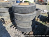 Set of 4 11r22. 5 tires on steel rims, stock # 55196