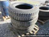 Skid of 4 - 10r22. 5 drive tires, stock # 55191