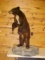 New mount . Chocolate bear cub with lots of white on His chest