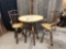 Pub height hickory table and swivel chairs