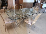 Glass top table with antler accent