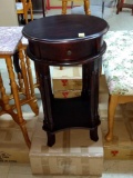 Pair of round single drawer accent tables