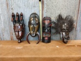 4 hand carved ceremonial wood masks