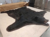 Huge black bear rug