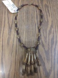 Native American reservation made bear paw necklace