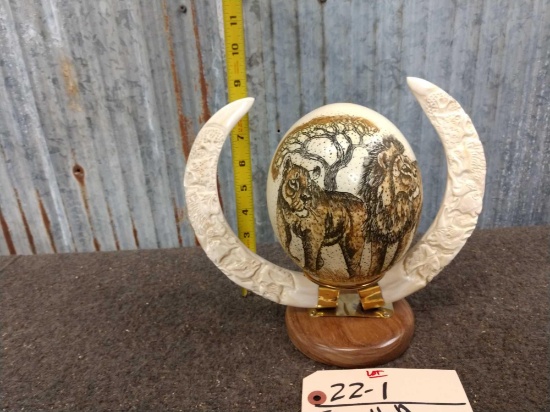 Scrimshawed Ostrich Egg Framed With Carved Warthog Tusk