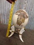 Scrimshawed Ostrich Egg On Ivory Warthog Tusk Base