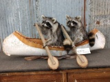 2 Raccoons In A Birch Bark Canoe