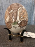 Scrimshawed Ostrich Egg On Polished Horn Stand