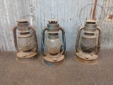 3 vintage kerosene lanterns