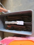 Tool Caddy full of Chisels and Pry Bars