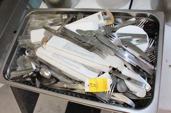 Stainless Container of Flatware.