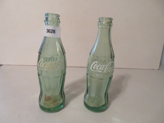 2 Coke Bottles