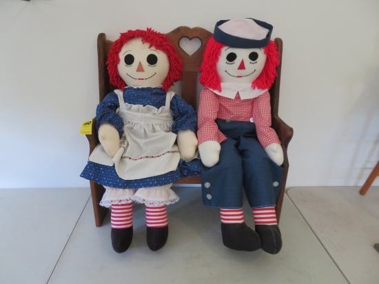 Raggedy Ann & Andy Dolls on a  Heart Bench