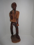 Carved Wooden Statue of African American Male Selling Wares at Market