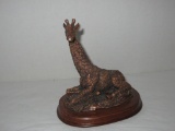 Giraffe Figurine On Wood Base