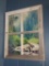 Rustic piece divided as window panes and reflect photo of woodland scene