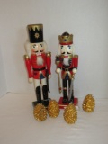 Lot - Dept. 56 gold pinecones & set of 2 nutcrackers