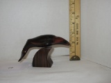 Wooden carved dolphin figurine