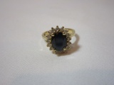 Oval Sapphire Mounted In 14k Yellow, Surrounded by 16 Diamonds - See Picture for Appraisal