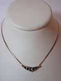 14k Yellow Gold Necklace w/ Marquise Shape Sapphires & 8 Tapered Diamond Baguettes