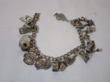 Sterling Charm Bracelet w/ Misc.  Sterling & Silver Charms