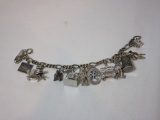 Sterling Charm Bracelet w/ Misc.  Sterling & Silver Charms