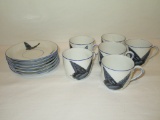 4 Porcelain Demi Cups & Saucers