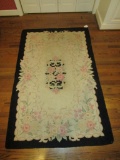 Hand Hooked Rug with Black Border   64