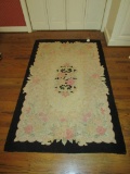 Hand Hooked Rug with Black Border   64