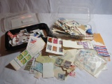 WORLDWIDE LOT OF STAMPS ON PAPER