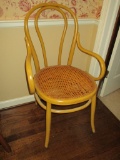 Bentwood Arm Chair w/Cane Bottom.  Cane needs to be repaired.  See pictures