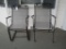 Pair of Wrought Iron Patio Chairs - 1 Stationary & 1 Spring