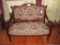 Flame Grain Upholstered Mahogany Settee w/ Carved Back & Arms on Casters - matches 187, 188,189