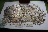 7.2 lbs. of foreign coins and currency