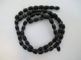 Oval Black 6 Layer Chevron Beads