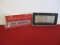 Pair of Oldsmobile Advertising License Plates