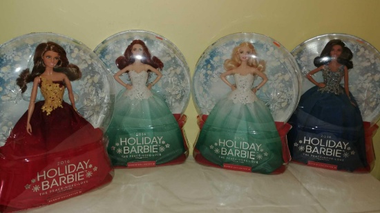 Lot of four 2016 Holiday Barbies Peace Hope Love collection