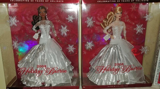 Two 2008 Holiday Barbies and two 2012 Holiday Barbies